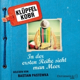 In der ersten Reihe sieht man Meer - Volker Klüpfel, Michael Kobr